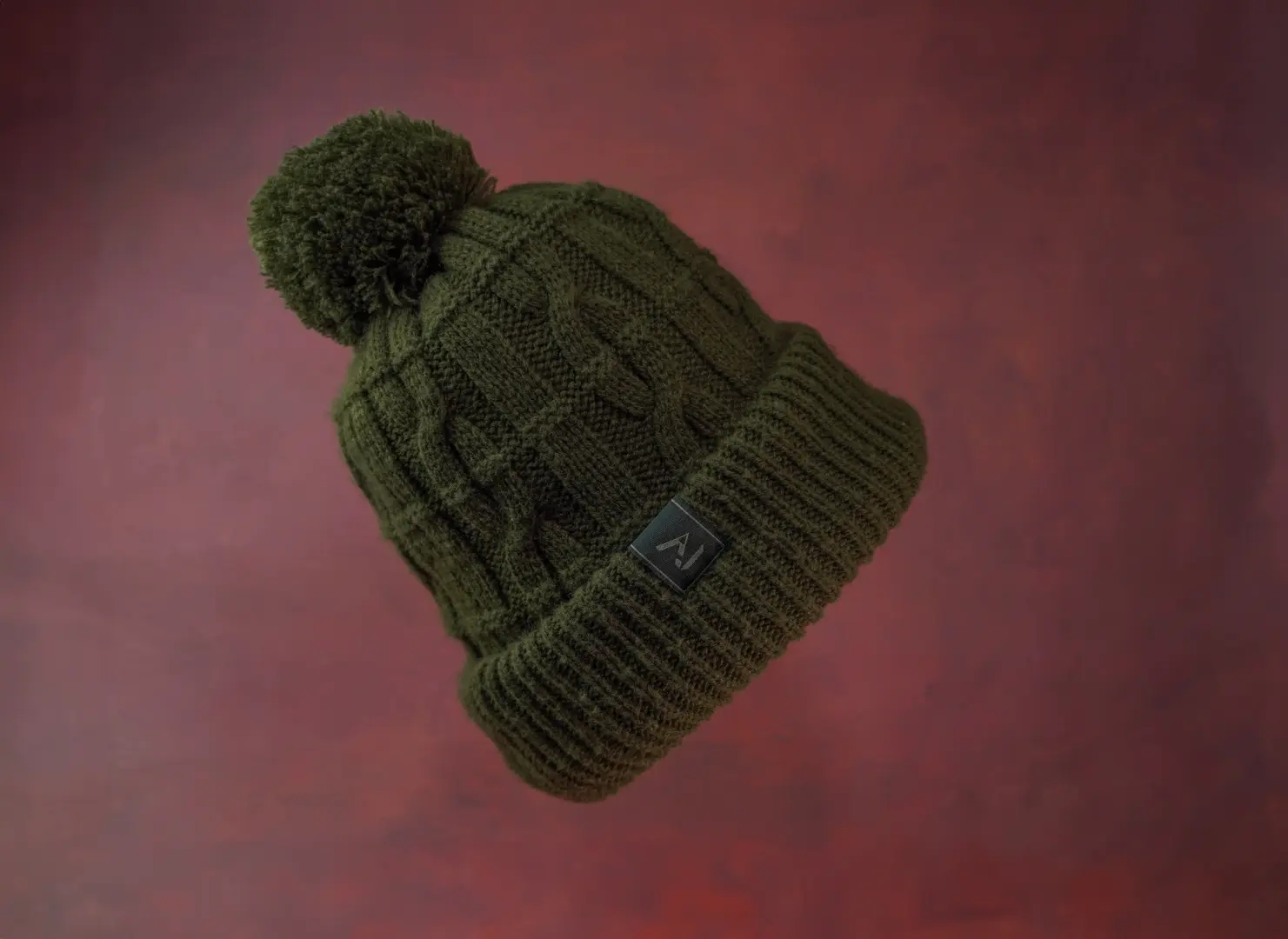 One More Cast Forest Green Cable Knit Bobble