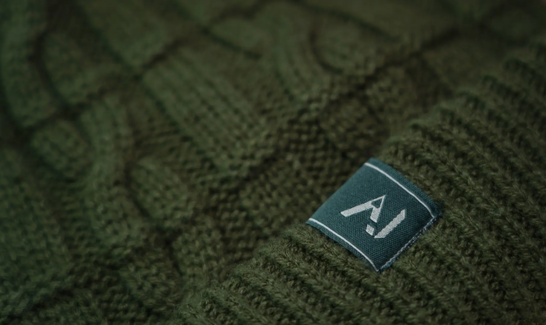 One More Cast Forest Green Cable Knit Bobble